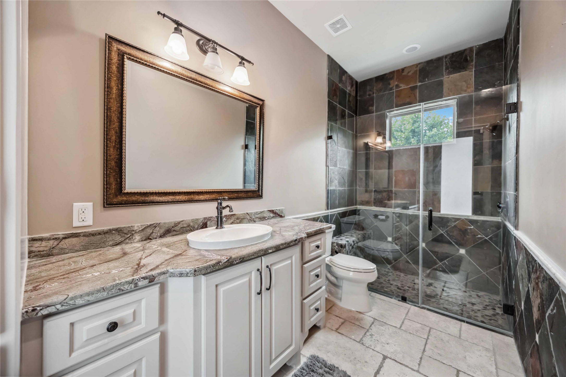 4510 Siandra Creek Court Spring, TX 77386 - Photo 23 of 50 a bathroom with a granite countertop sink mirror and toilet