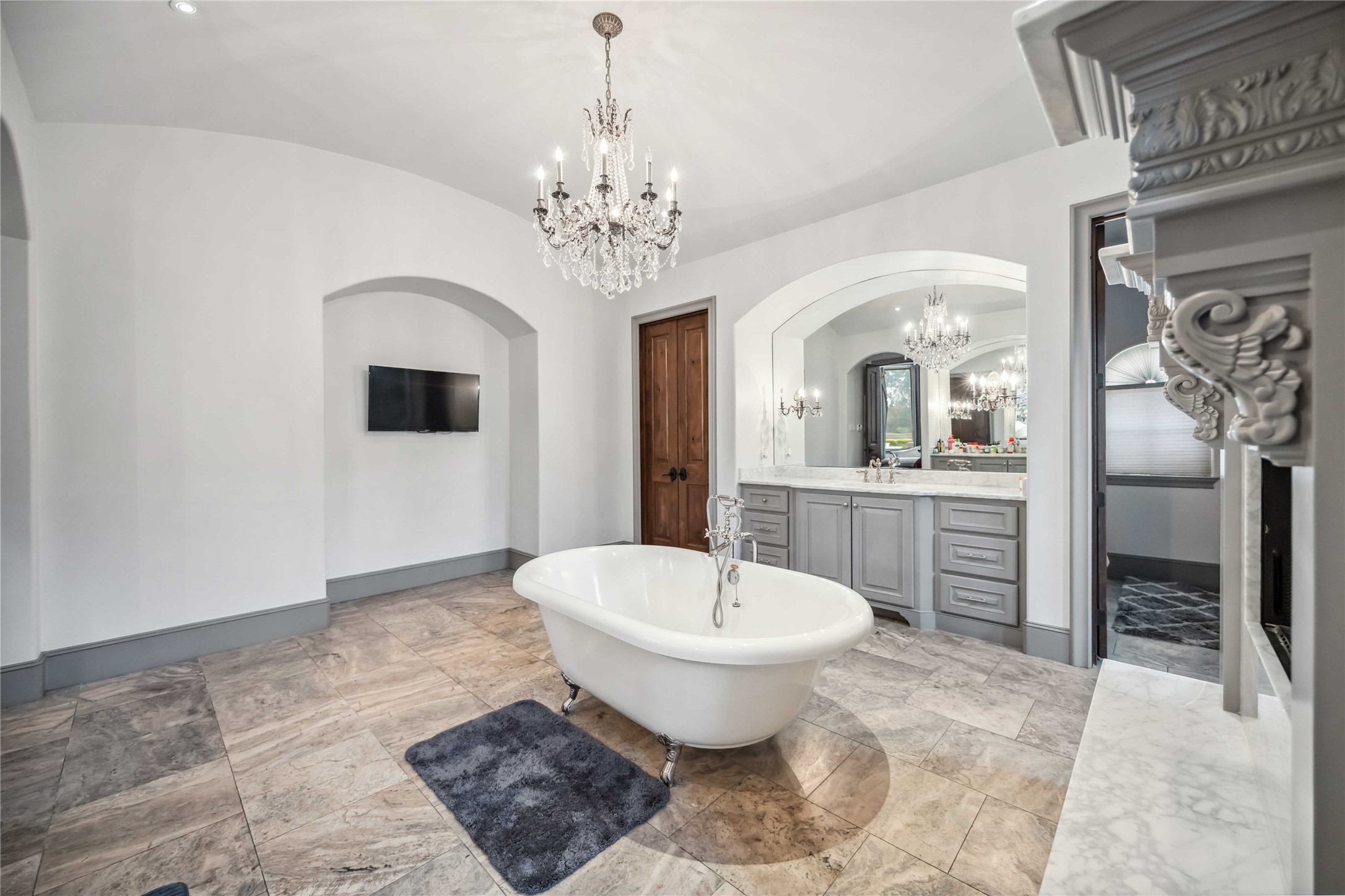4510 Siandra Creek Court Spring, TX 77386 - Photo 32 of 50 a spacious bathroom with a toilet sink and mirror