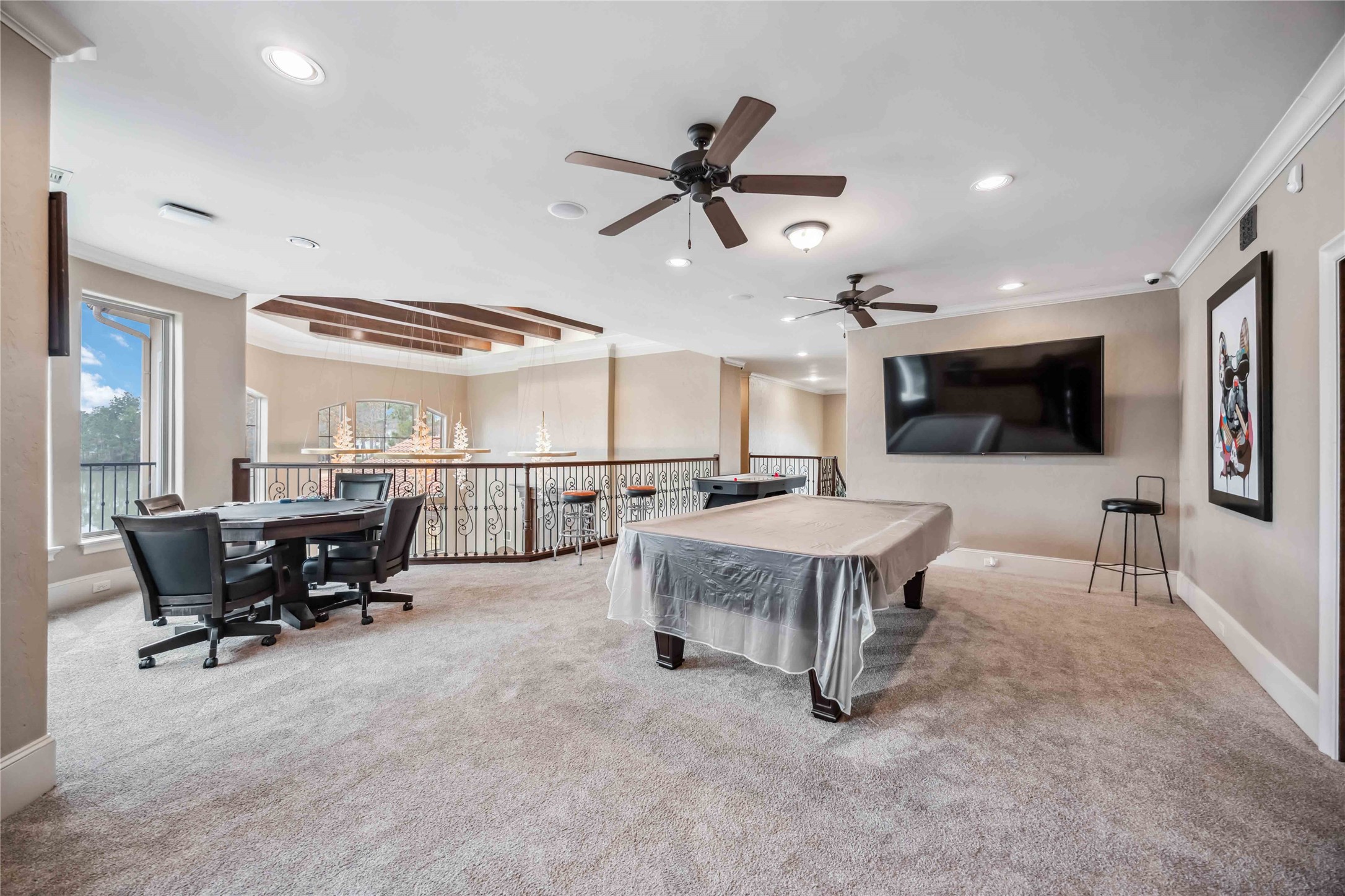 4510 Siandra Creek Court Spring, TX 77386 - Photo 37 of 50 a living room with furniture and a flat screen tv