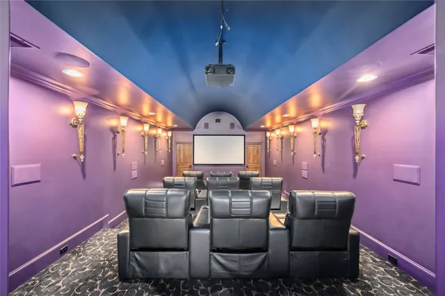 a bedroom with furniture and a chandelier