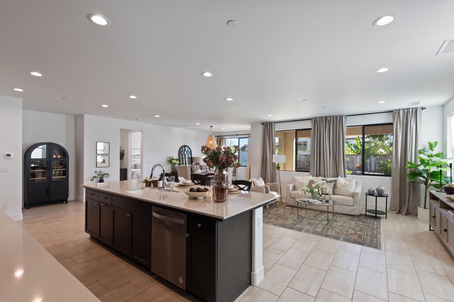 1022 Moonrise Way Madera, CA 93636 - Photo 13 of 52 a kitchen with a sink and cabinets