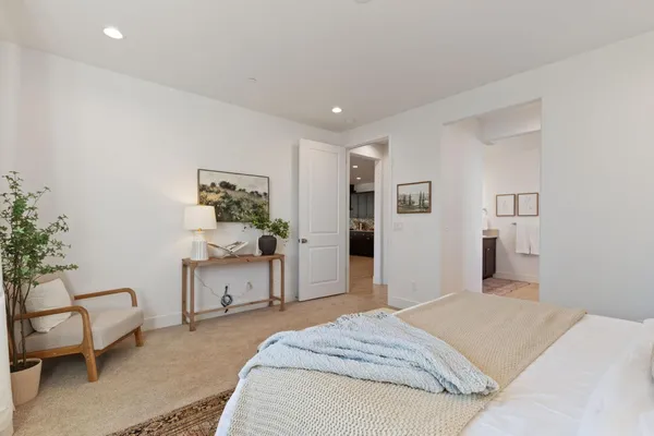 a bedroom with a bed and furniture