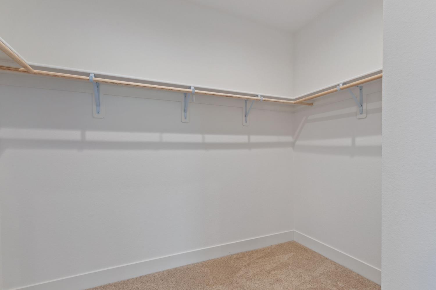 1022 Moonrise Way Madera, CA 93636 - Photo 22 of 52 a view of an empty walk in closet