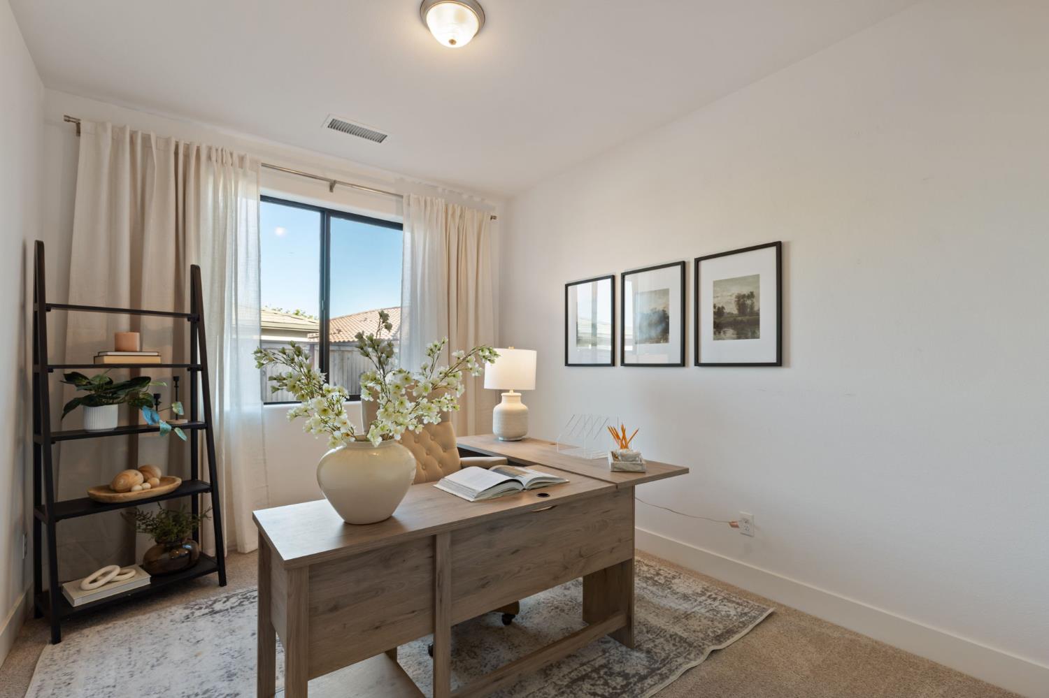 1022 Moonrise Way Madera, CA 93636 - Photo 23 of 52 a view of a dining room with furniture