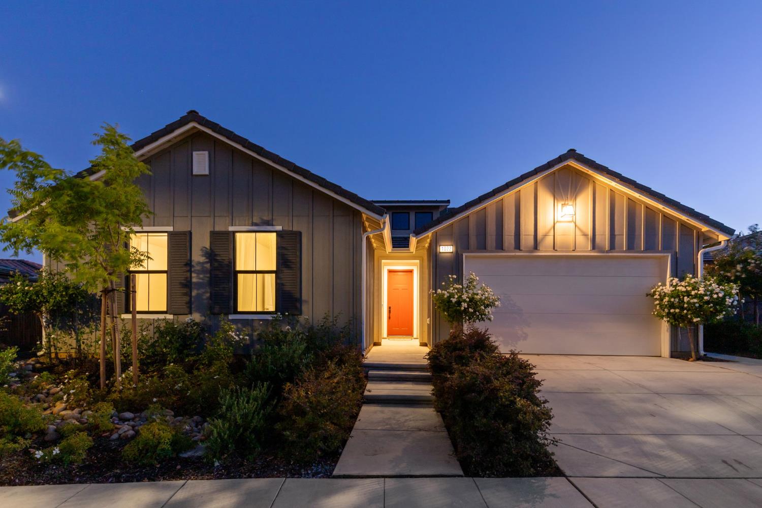 1022 Moonrise Way Madera, CA 93636 - Photo 38 of 52 a front view of a house with a yard