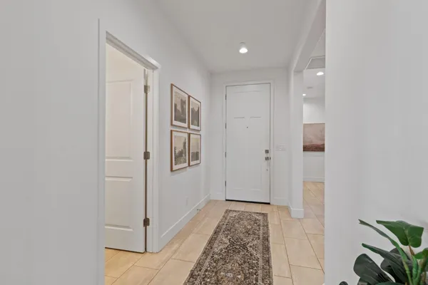 a view of livingroom with hardwood floor and hallway