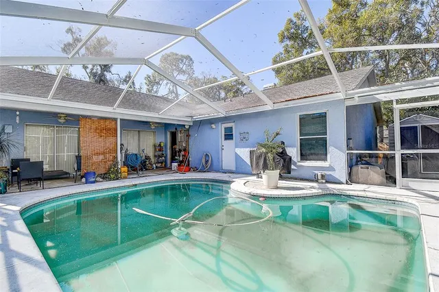 a view of a chairs and table in a patio