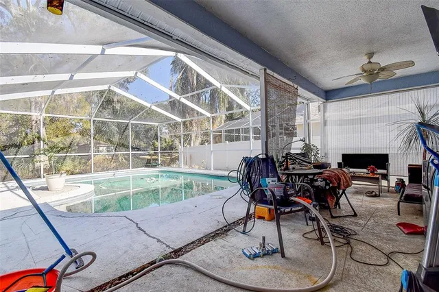 a living room with patio furniture