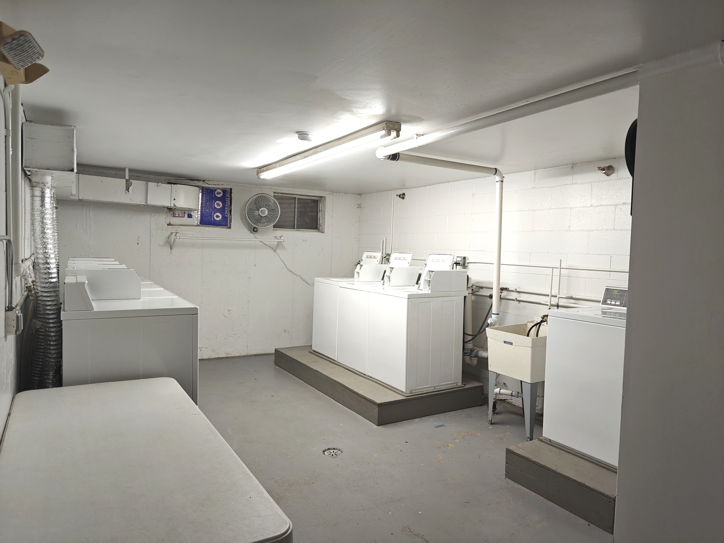4721 St Joseph Creek Road, Unit 5F Lisle, IL 60532 - Photo 17 of 19 a utility room with cabinets washer and dryer