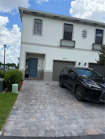 a car parked in front of a house
