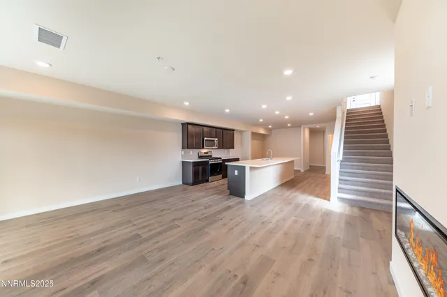 a view of kitchen with wooden floor