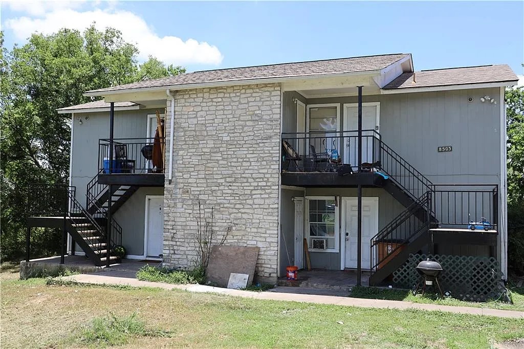 8503 Colony Loop Drive Austin, TX 78724 - Photo 1 of 4 front view of a house with a yard