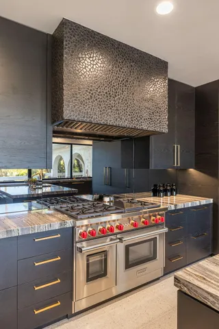 a view of a livingroom with furniture and a flat screen tv