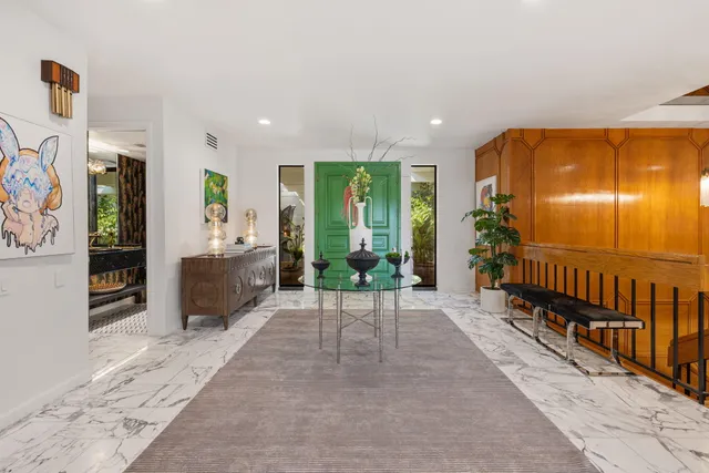 a view of a workspace with furniture