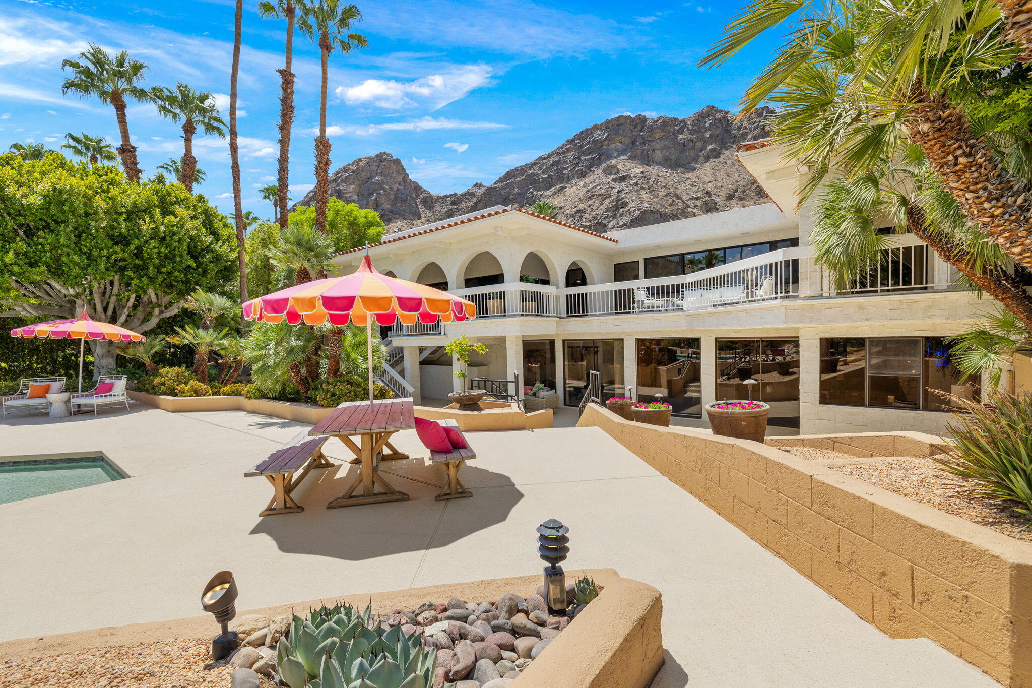 70663 Oroville Circle Rancho Mirage, CA 92270 - Photo 38 of 47 a front view of a building with umbrellas