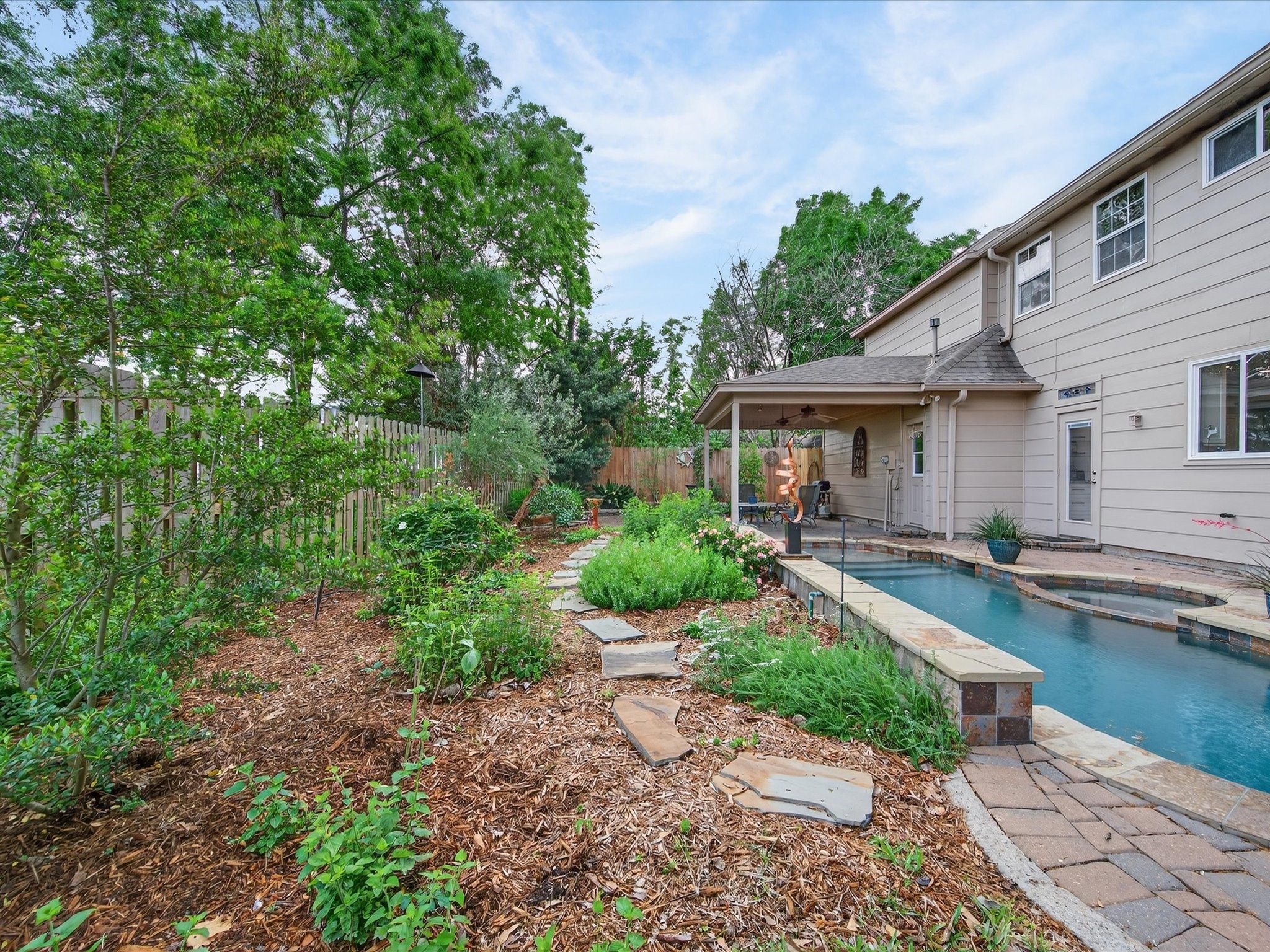 6207 Sandypine Drive Spring, TX 77379 - Photo 40 of 46 Thoughtfully designed in 2023, this Audubon certified, bird-friendly habitat garden has all Texas native plants and trees. This landscape creates a peaceful, bird-friendly habitat right at home.