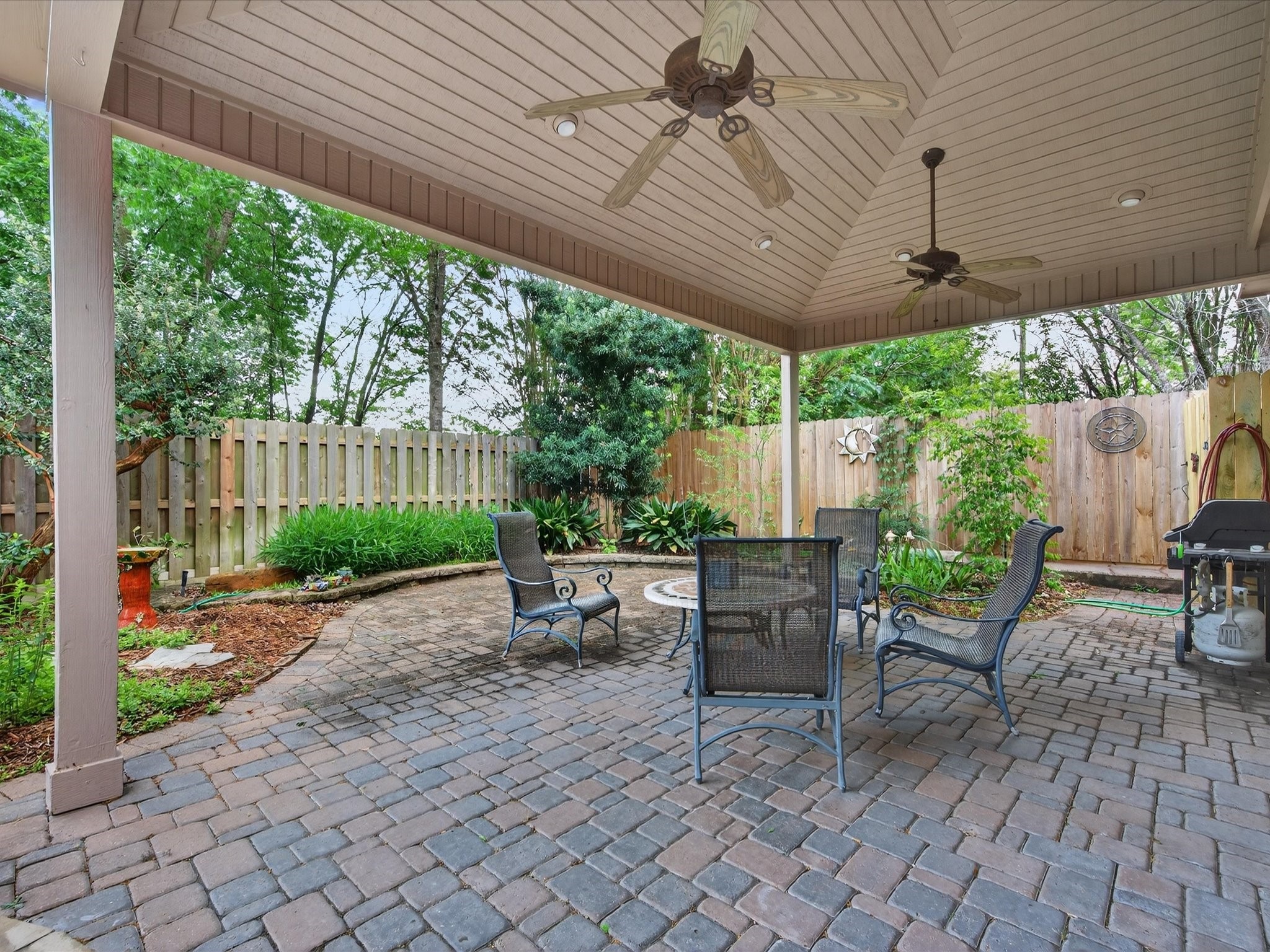 6207 Sandypine Drive Spring, TX 77379 - Photo 41 of 46 Enjoy outdoor living under the covered cabana patio—perfect for entertaining or unwinding in your own secluded retreat.