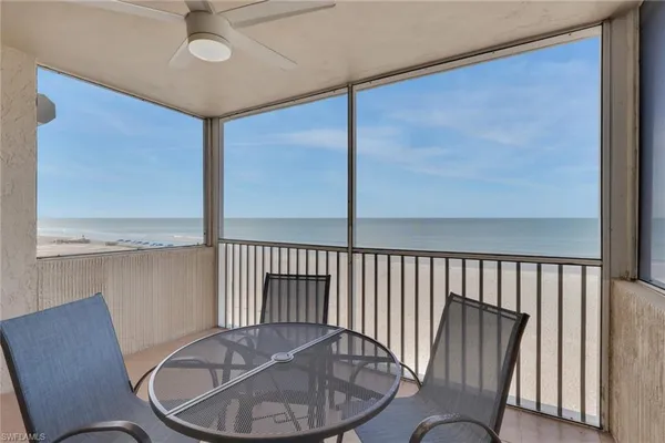 a view of a porch with furniture