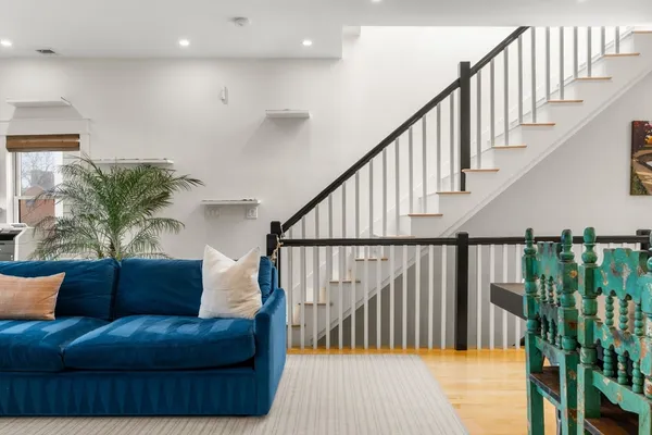 a view of entryway with wooden floor