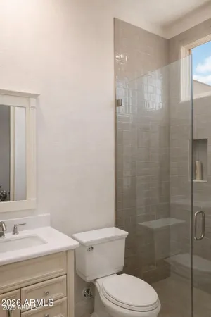 a bathroom with a toilet a sink and a bathtub