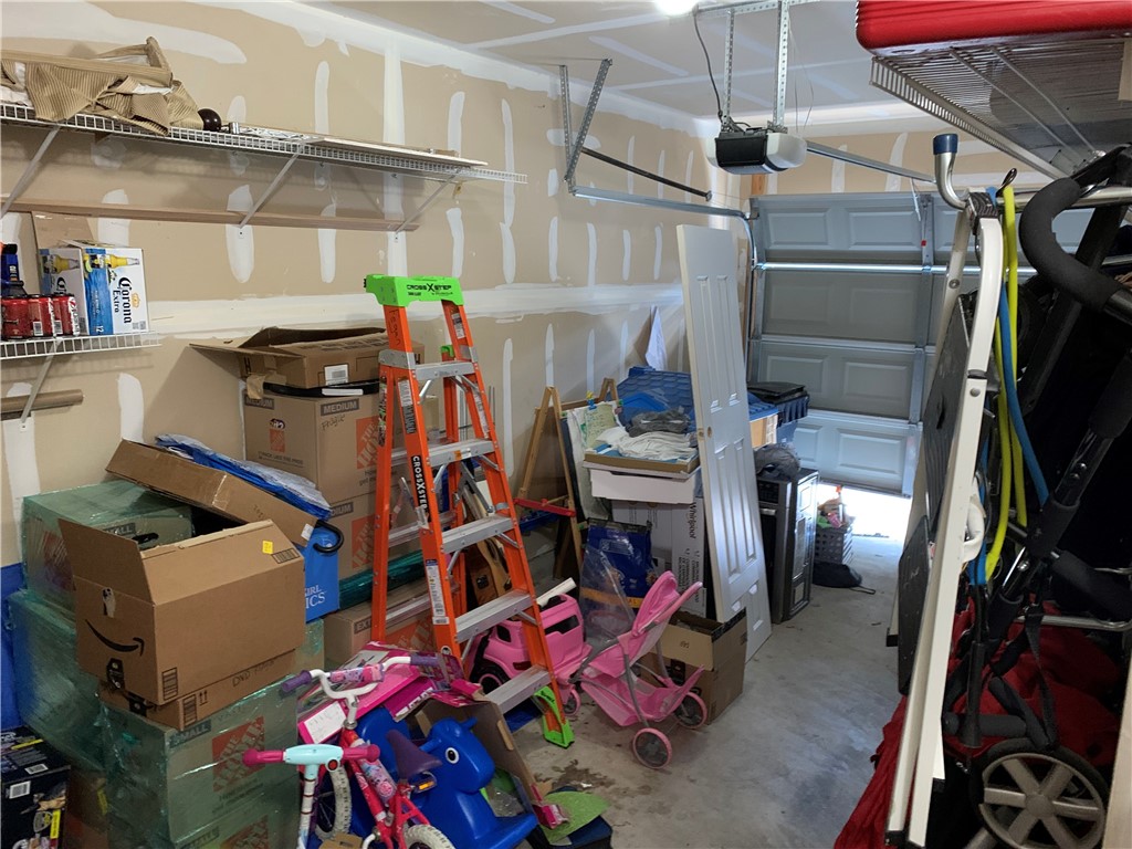 1900 Scofield Ridge Parkway, Unit 1202 Austin, TX 78727 - Photo 13 of 18 One car garage is attached and has automatic opener