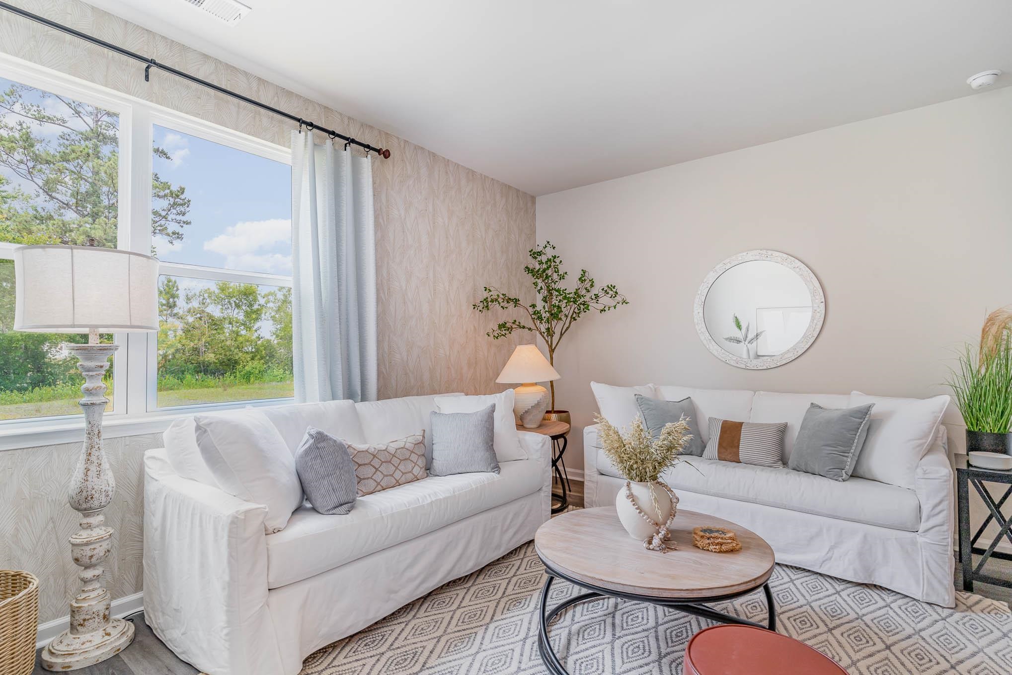 930 Farmers Psge Loop Loris, SC 29569 - Photo 9 of 17 Living room with wallpapered walls and wood finished floors