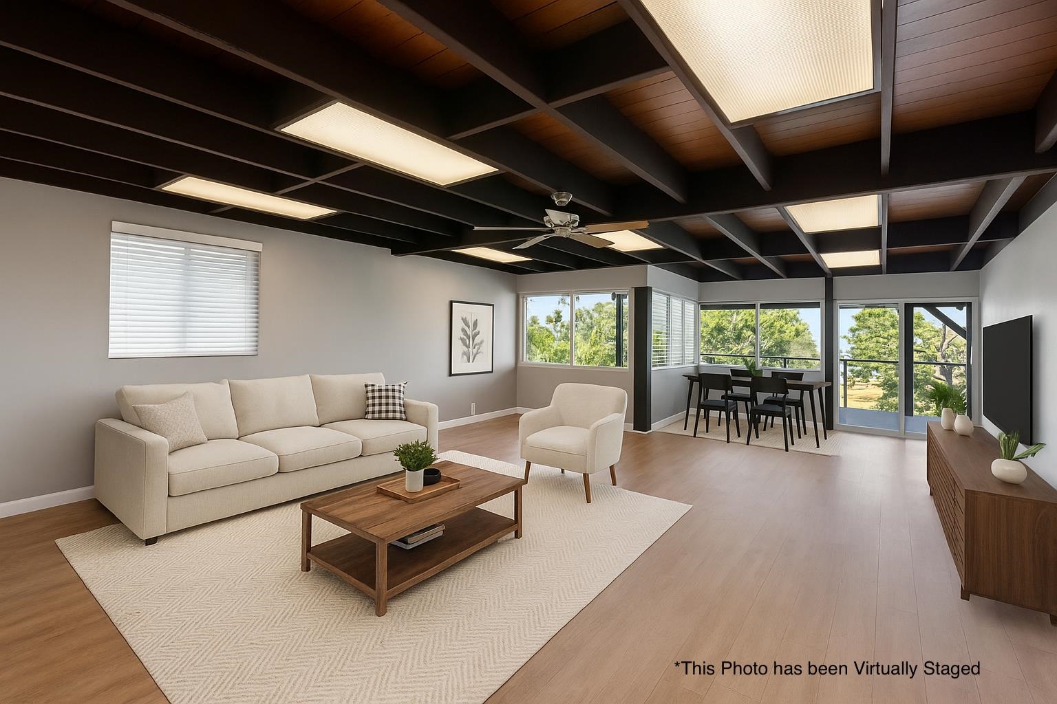 3124 Nahenahe Place Kihei, HI 96753 - Photo 49 of 50 a living room with furniture a wooden floor and next to a window