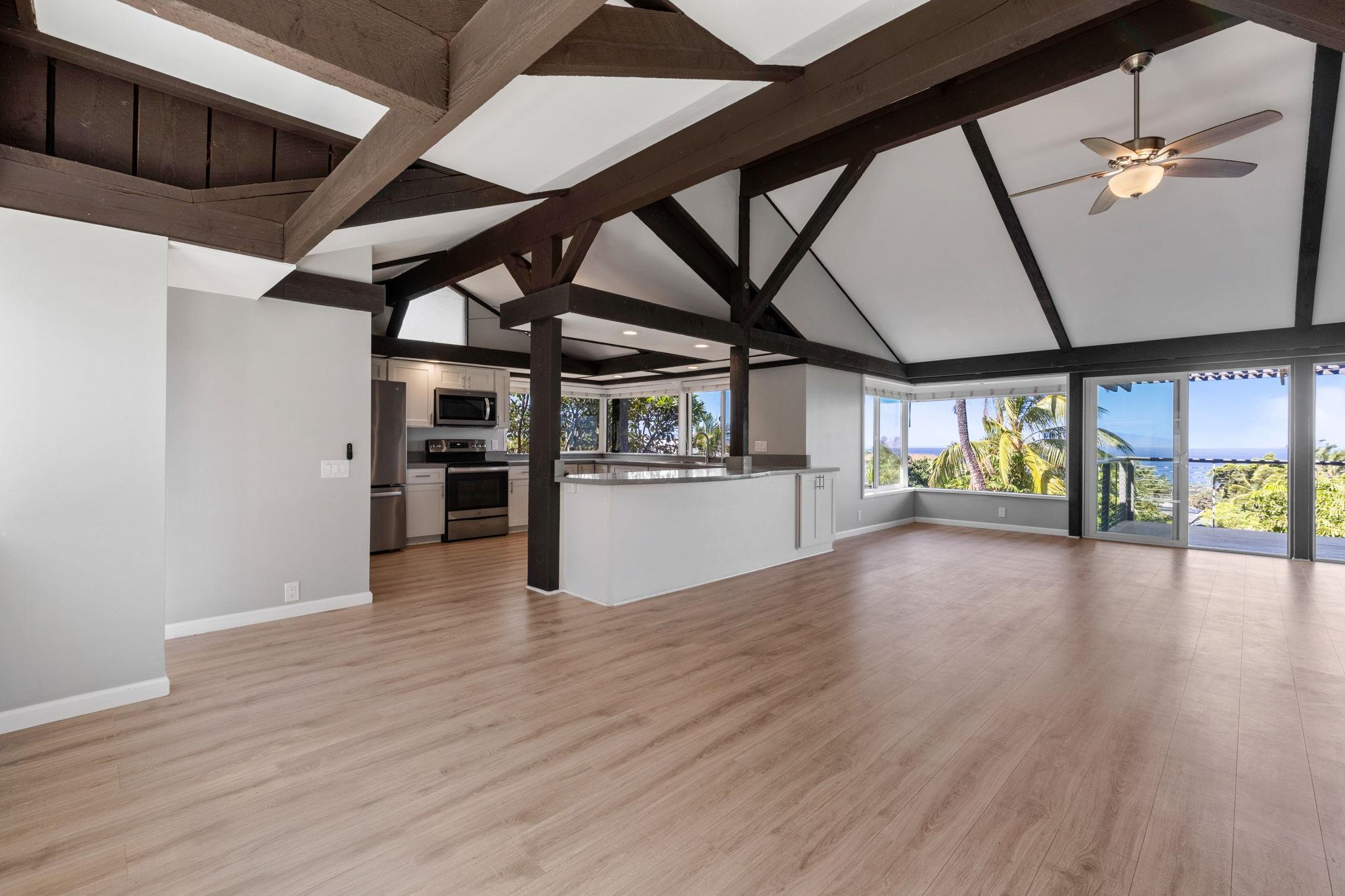 3124 Nahenahe Place Kihei, HI 96753 - Photo 6 of 50 a view of a water heater room with wooden floor