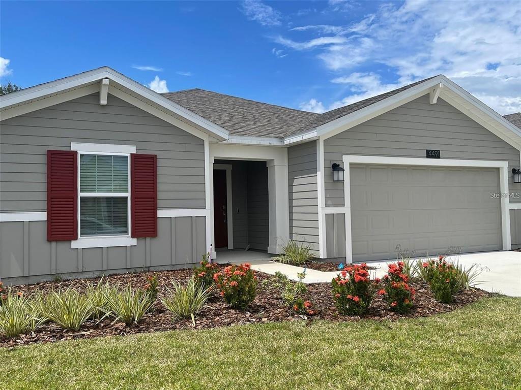 4491 Magnolia Ridge Court Kissimmee, FL 34746 - Photo 1 of 21 a front view of house with yard