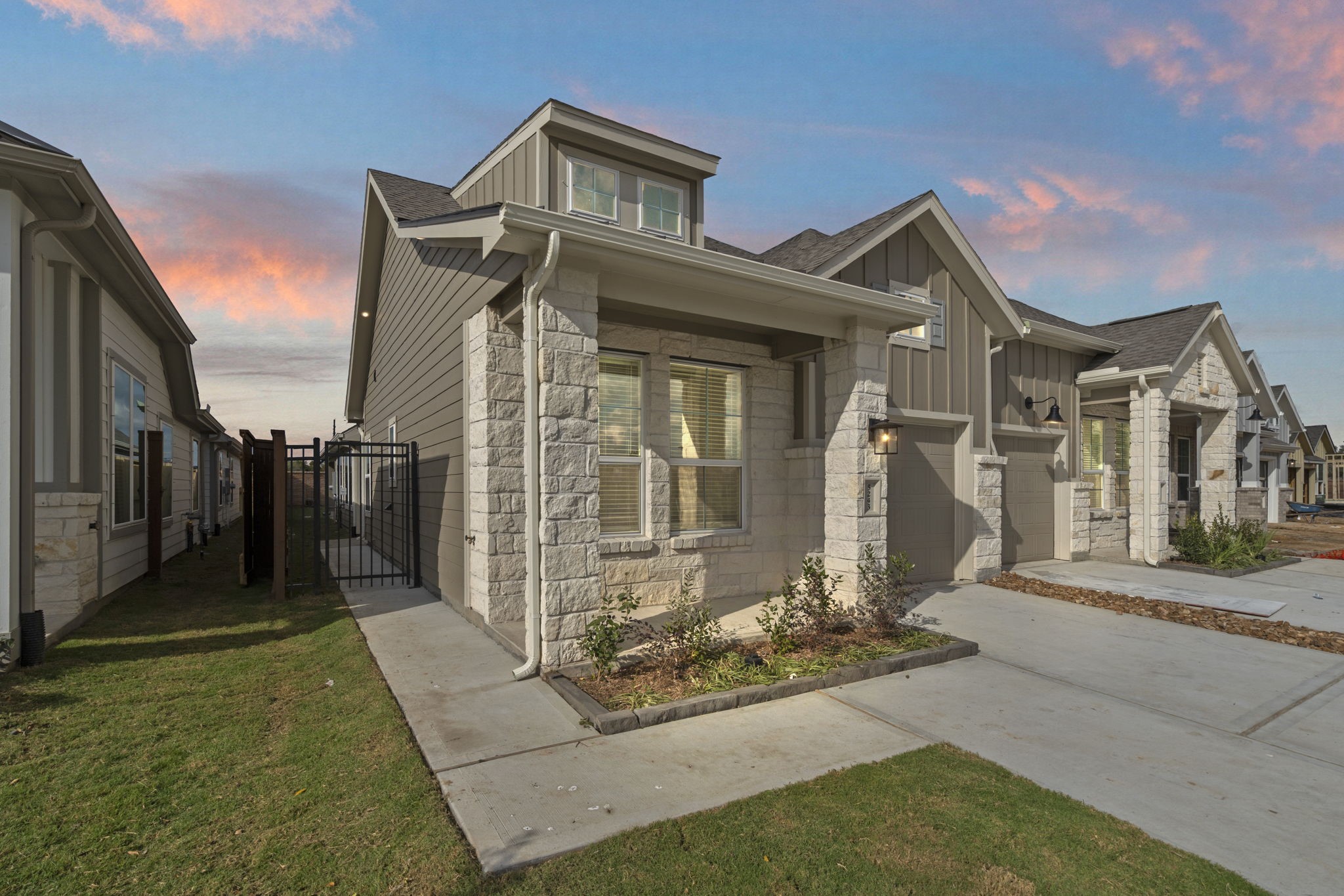 a front view of a house with a yard