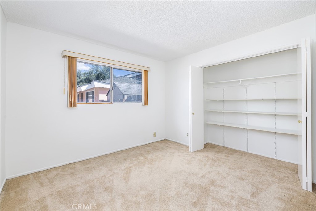 15838 Eccles Street North Hills, CA 91343 - Photo 22 of 38 a view of an empty room with a window