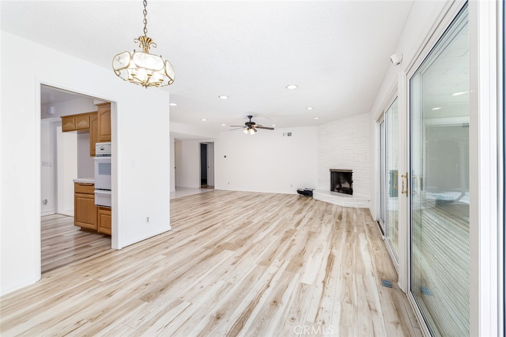 15838 Eccles Street North Hills, CA 91343 - Photo 5 of 38 a view of a bedroom with a bed and wooden floor