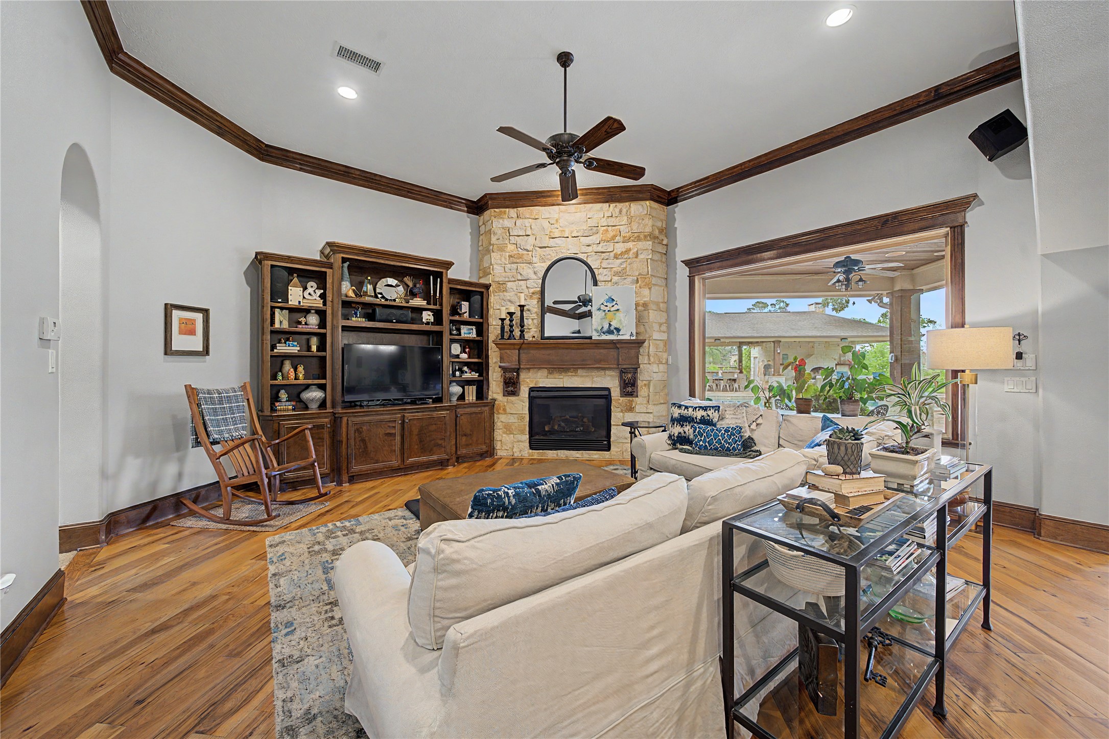 4423 Silver Jade Drive Spring, TX 77386 - Photo 14 of 45 a living room with fireplace furniture and a large window