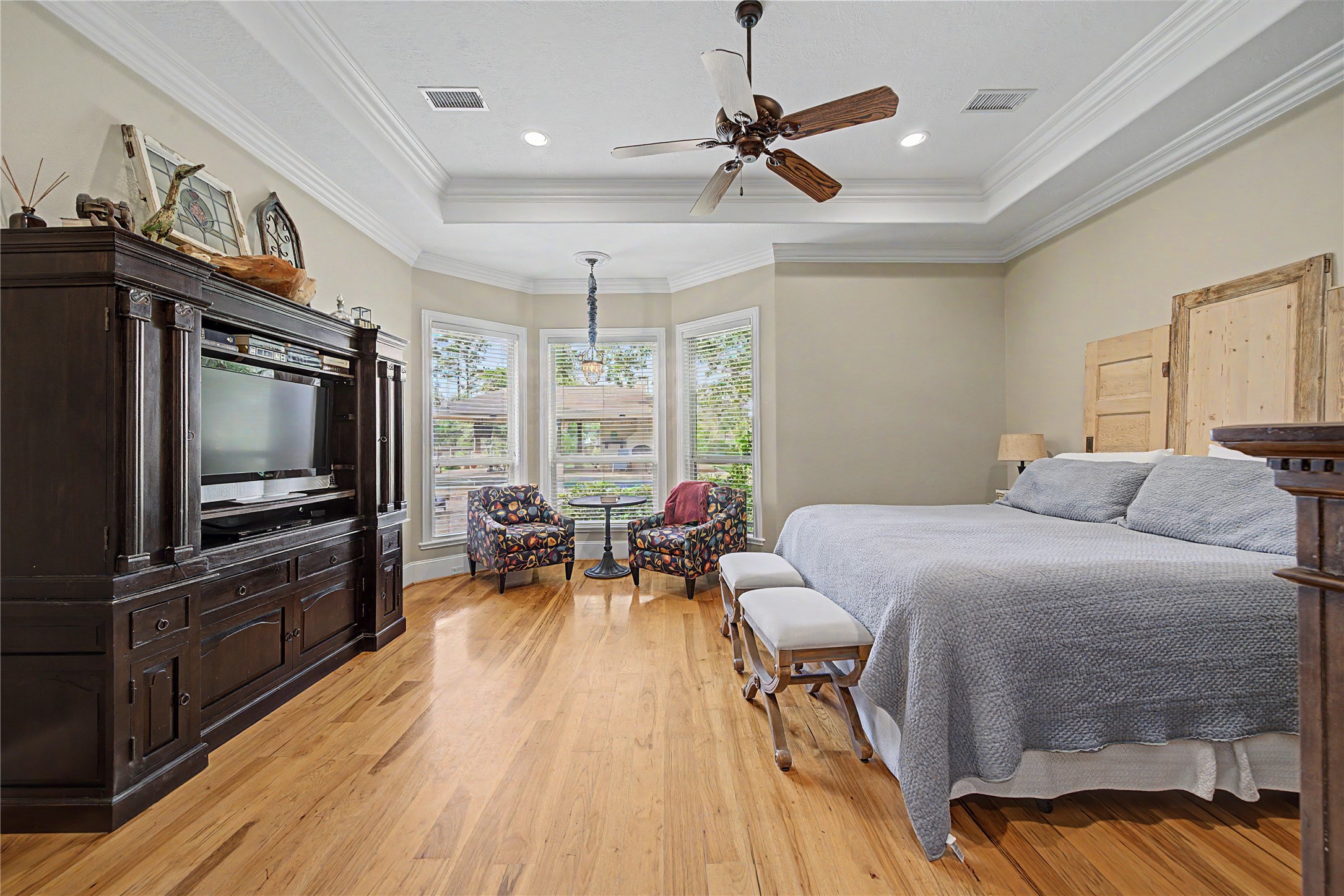 4423 Silver Jade Drive Spring, TX 77386 - Photo 16 of 45 a bedroom with a bed and a flat screen tv