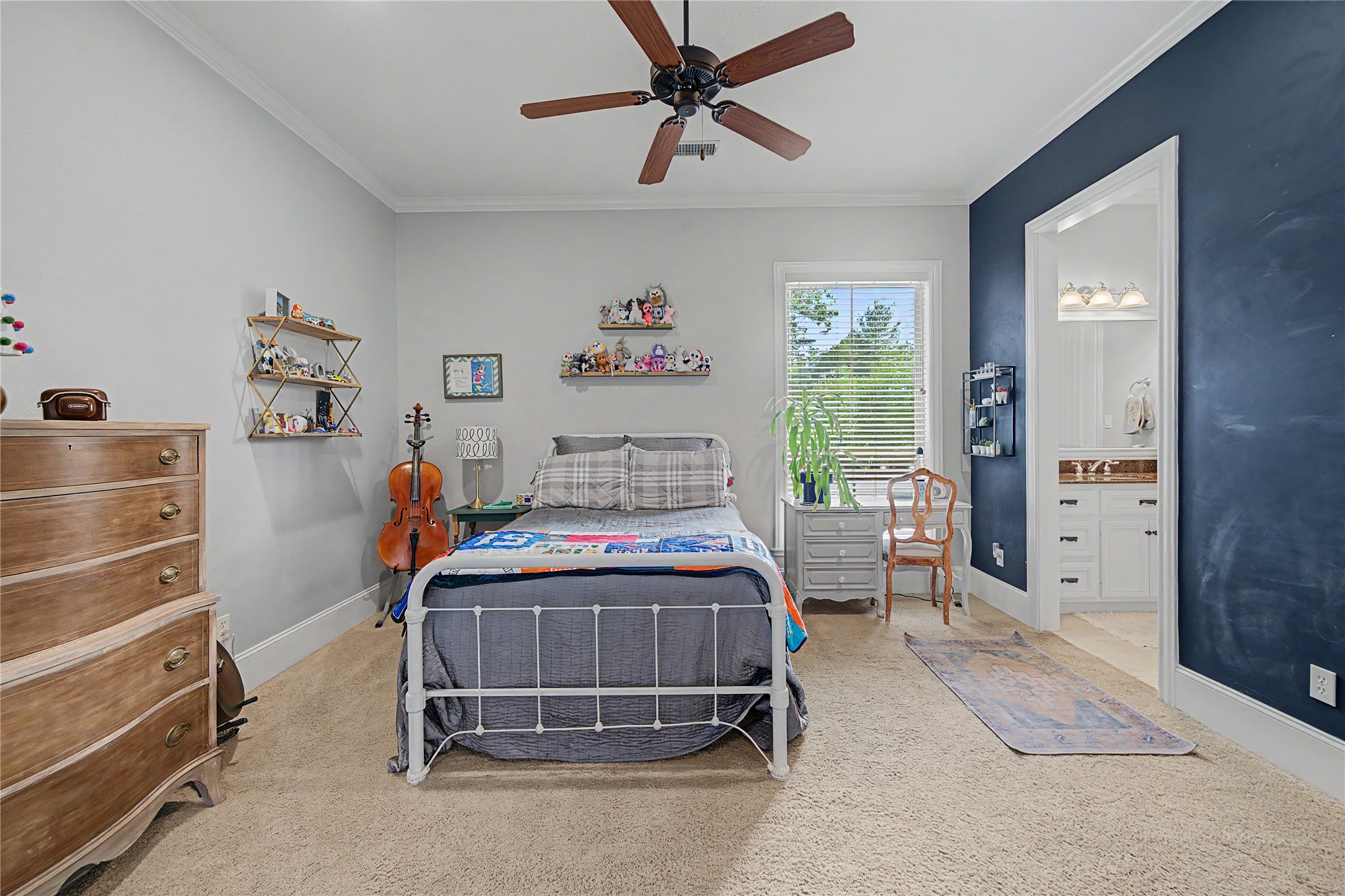 4423 Silver Jade Drive Spring, TX 77386 - Photo 24 of 45 a bedroom with a bed and a window