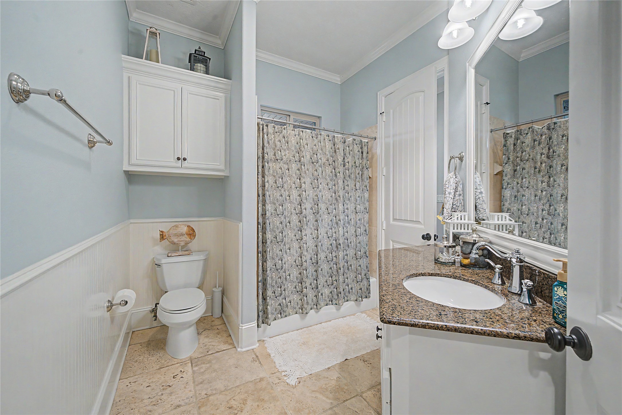 4423 Silver Jade Drive Spring, TX 77386 - Photo 25 of 45 a bathroom with a granite countertop sink a toilet and shower
