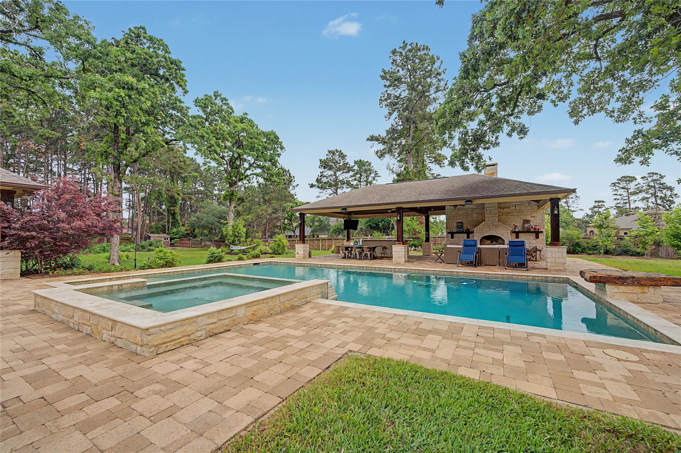 4423 Silver Jade Drive Spring, TX 77386 - Photo 30 of 45 a view of a house with a swimming pool