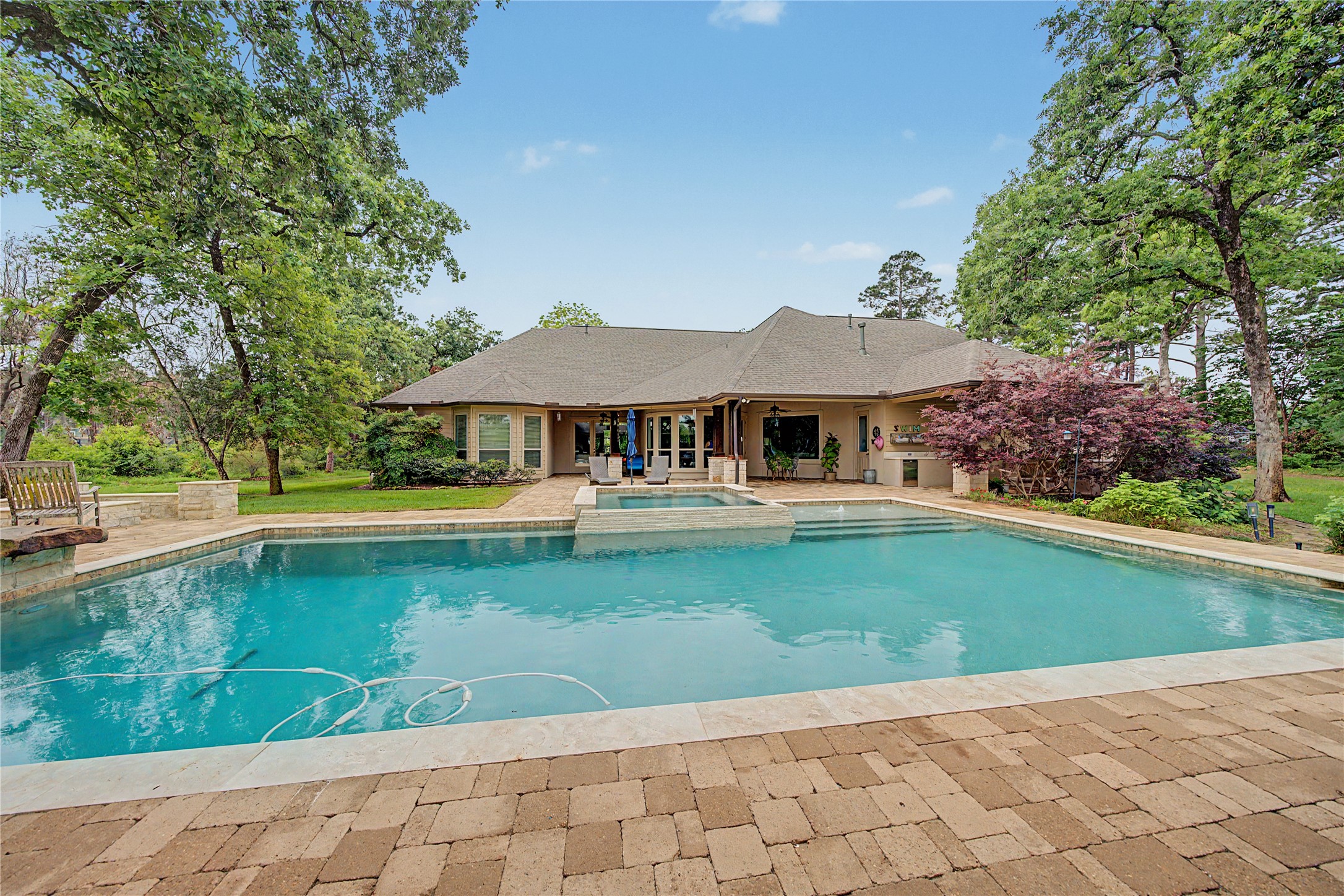 4423 Silver Jade Drive Spring, TX 77386 - Photo 31 of 45 a front view of a house with swimming pool having outdoor seating