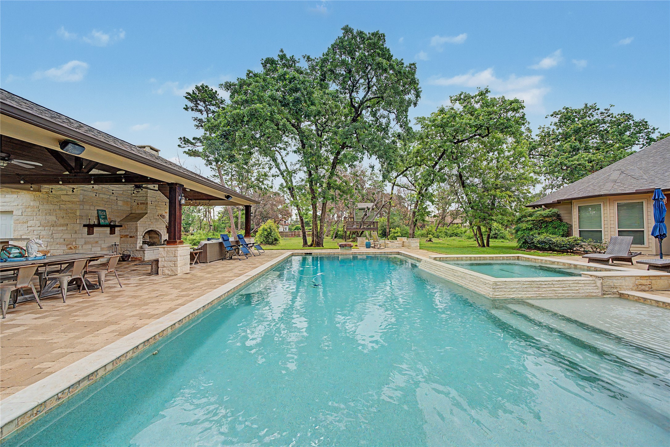 4423 Silver Jade Drive Spring, TX 77386 - Photo 32 of 45 a view of a house with swimming pool and sitting area