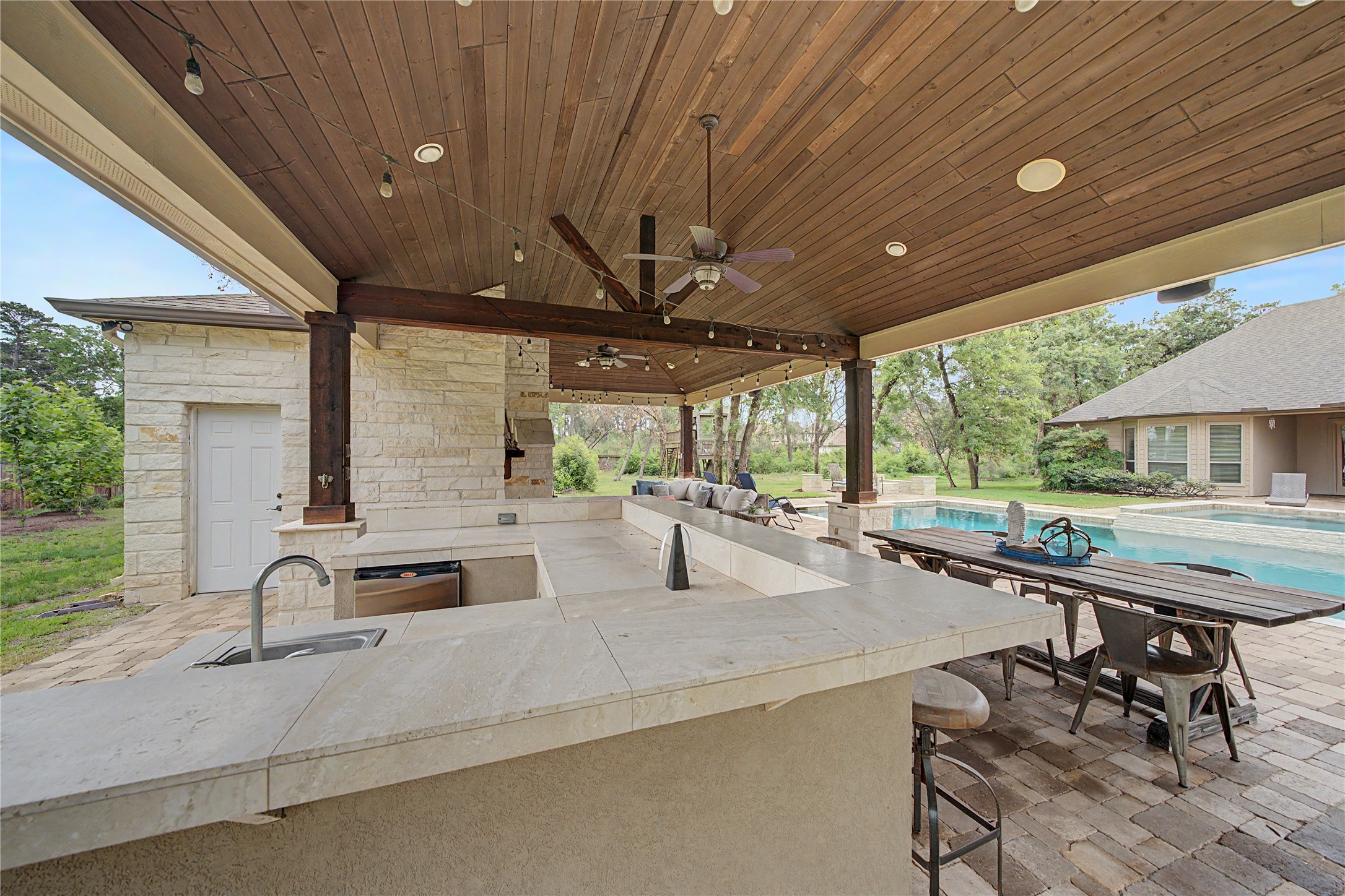 4423 Silver Jade Drive Spring, TX 77386 - Photo 36 of 45 a view of a patio with a table and chairs