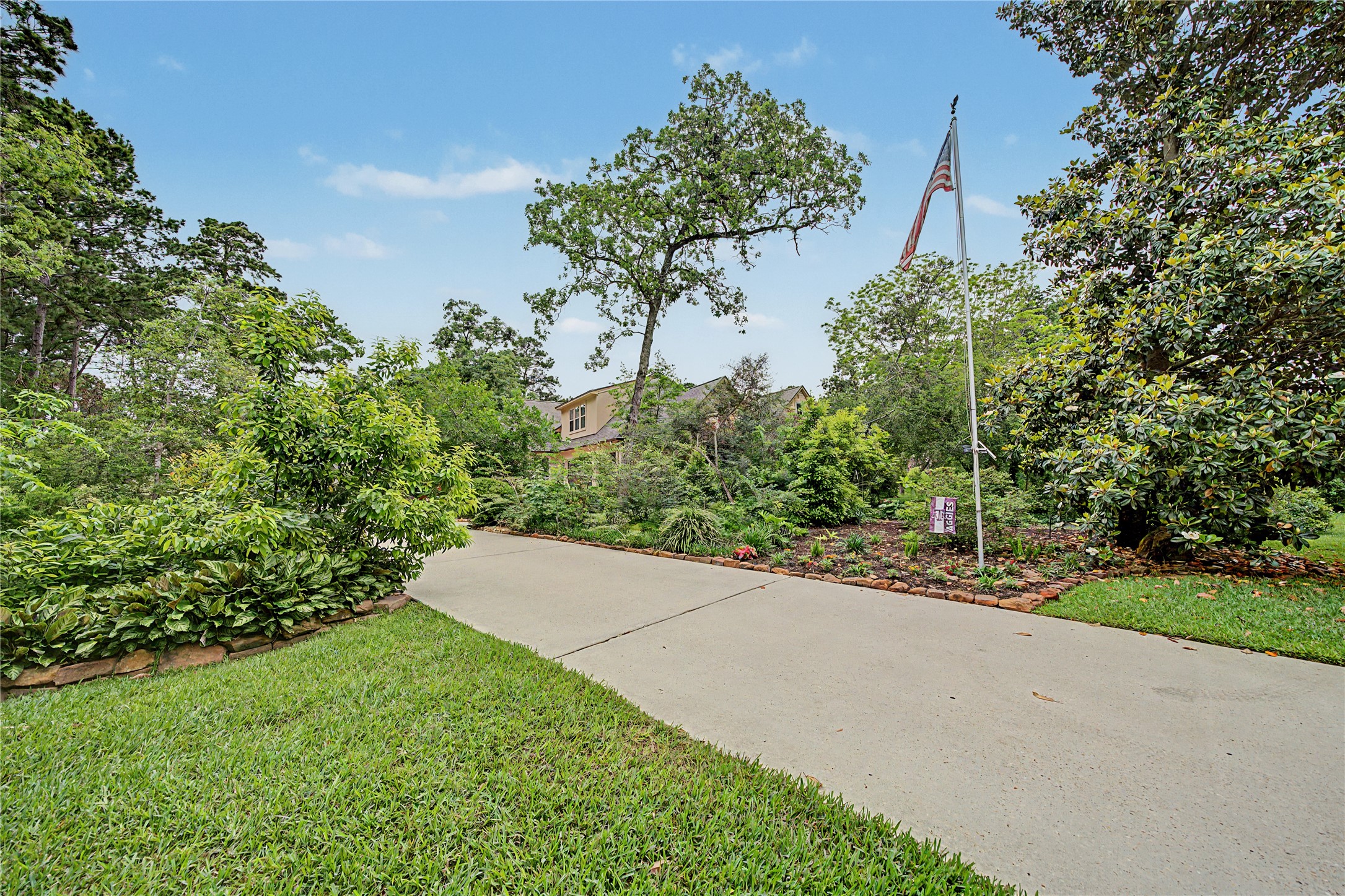 4423 Silver Jade Drive Spring, TX 77386 - Photo 41 of 45 a picture of a yard and trees