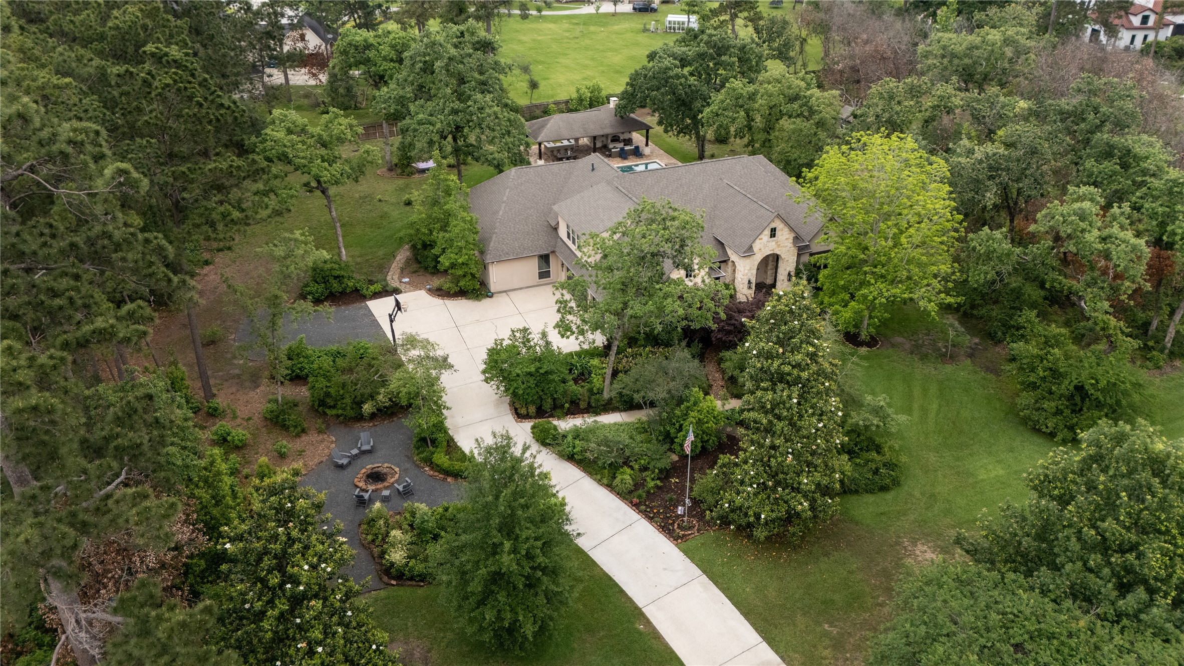 4423 Silver Jade Drive Spring, TX 77386 - Photo 44 of 45 an aerial view of a house with a yard and lake view