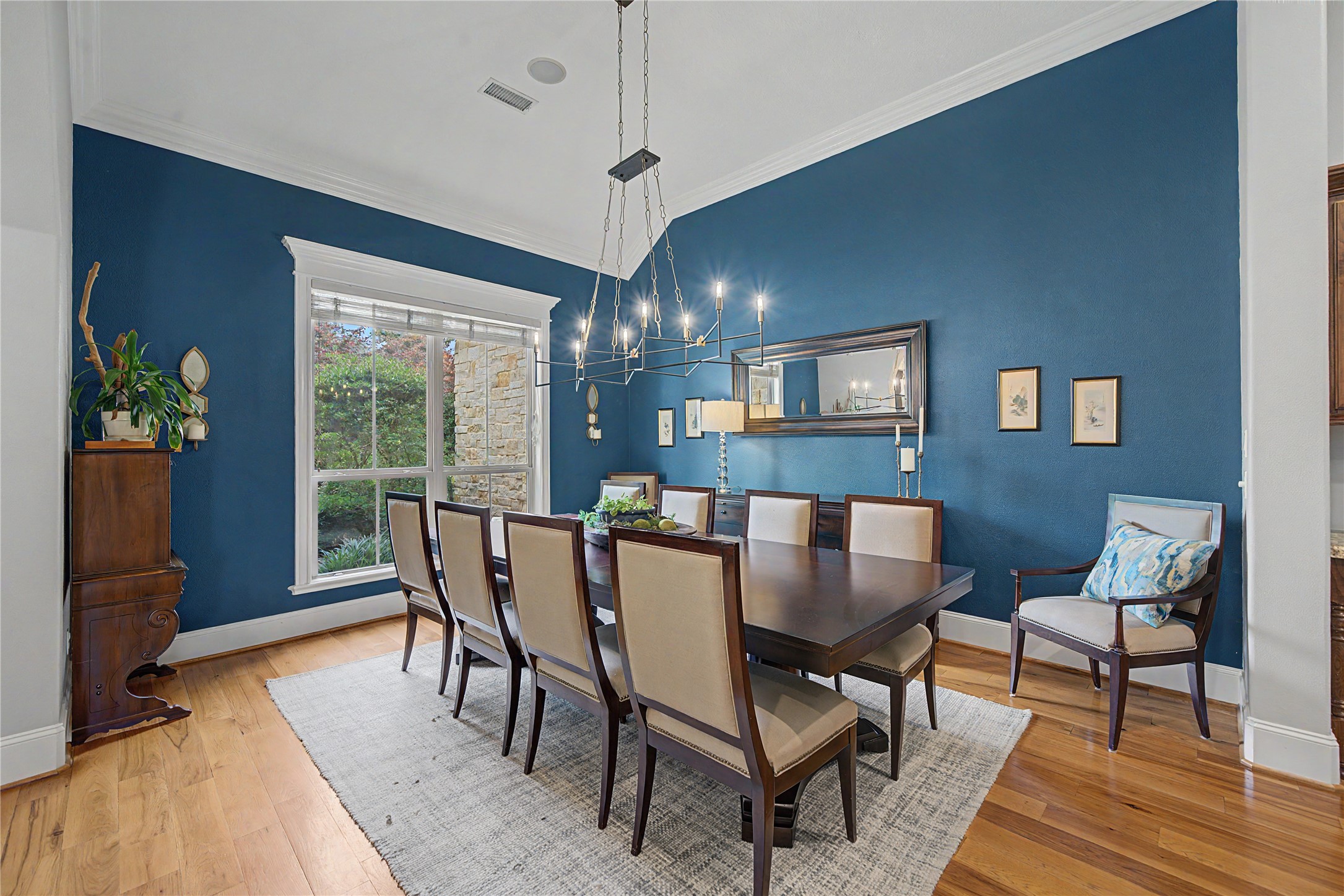 4423 Silver Jade Drive Spring, TX 77386 - Photo 5 of 45 a view of a dining room with furniture window and wooden floor