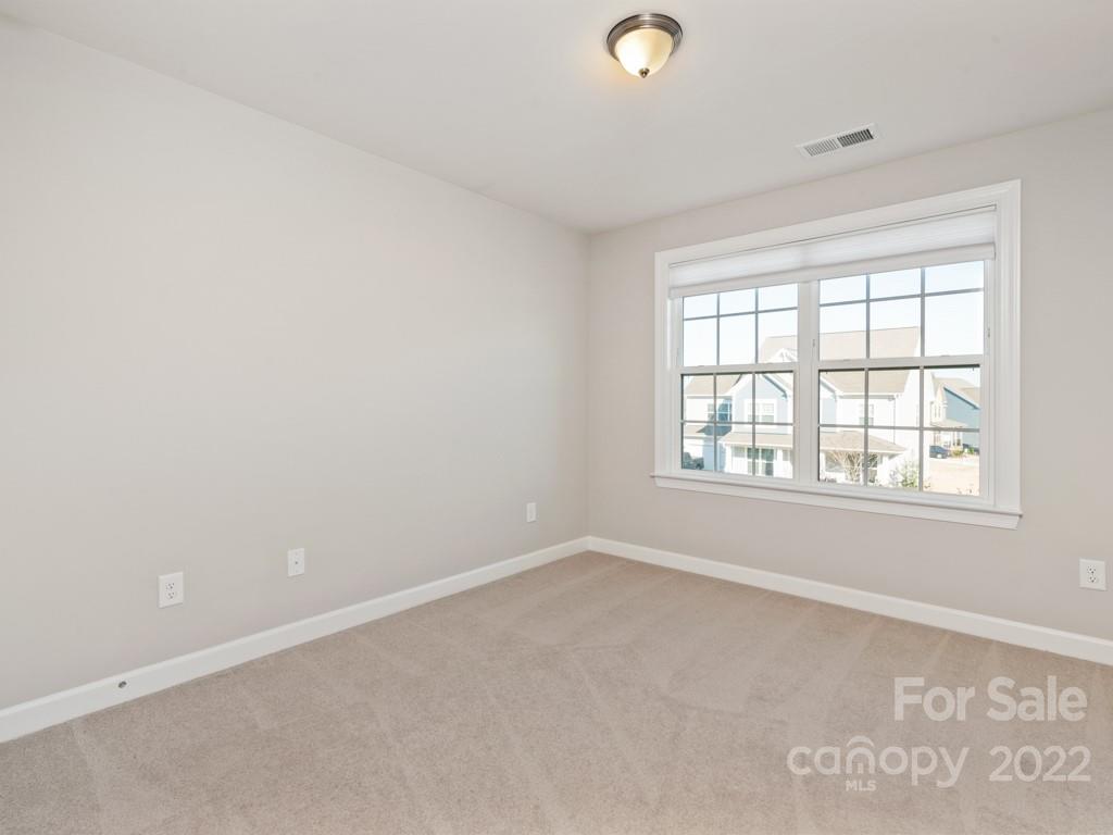 1335 Bryson Gap Drive Fort Mill, SC 29715 - Photo 21 of 29 an empty room with a window