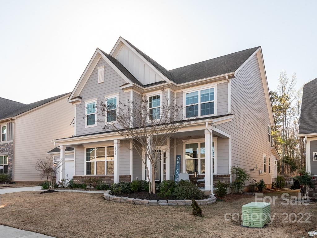 1335 Bryson Gap Drive Fort Mill, SC 29715 - Photo 29 of 29 a front view of a house with garden