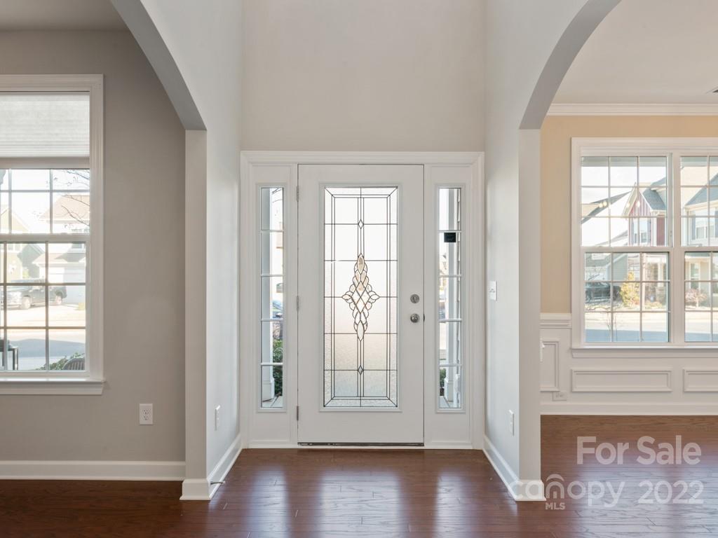 1335 Bryson Gap Drive Fort Mill, SC 29715 - Photo 3 of 29 an empty room with wooden floor and windows
