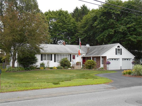 106 Lexington Road Billerica, MA 01821 - Photo 1 of 14 a view of a white house that has a tree in front of it