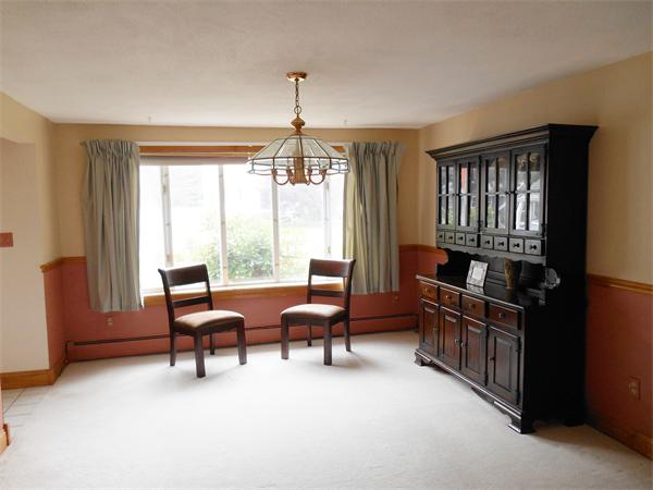 106 Lexington Road Billerica, MA 01821 - Photo 11 of 14 a living room with furniture and a window