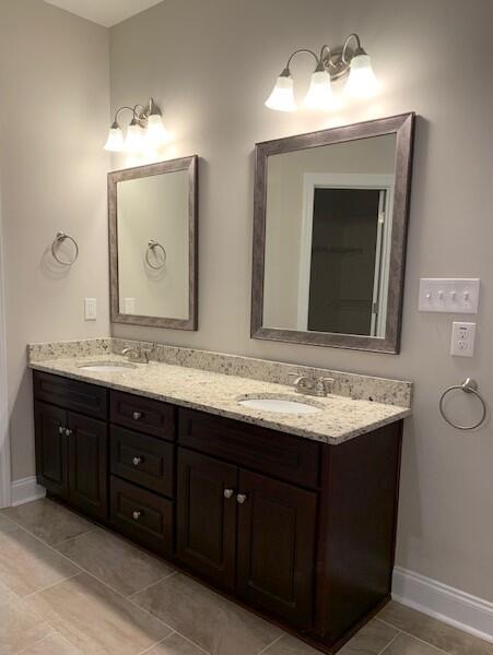 1285 Moose Club Road Thomson, GA 30824 - Photo 12 of 21 Owner's bath cherry cabinets with granite counters