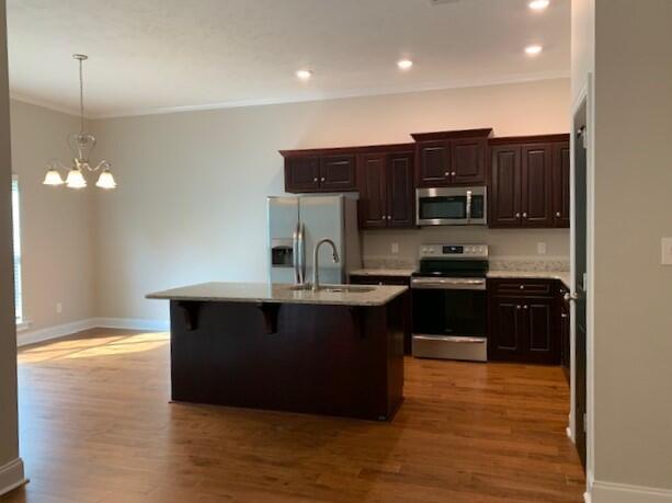 1285 Moose Club Road Thomson, GA 30824 - Photo 4 of 21 View of kitchen from living room